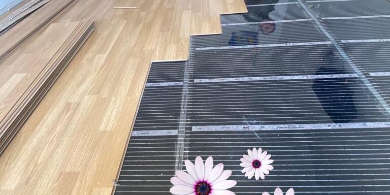 Carbon film heater installed on an enclosed balcony floor